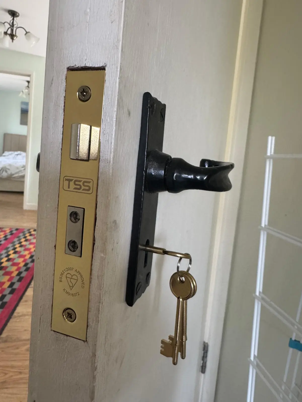 Locksmith fitting a mortice lock to a residential door